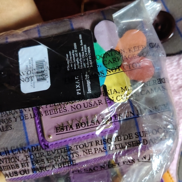 Loungefly Pink and Purple Backpack with Floral Accents - Picture 10 of 13